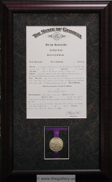 Framed certificate with medal.






The Gallery at Brookwood
www.thegallery.us
770-941-3394
Your Custom Framing Expert
Picture Framing Examples
Custom Framing Examples
Shadowbox Examples
certificate_with_metal