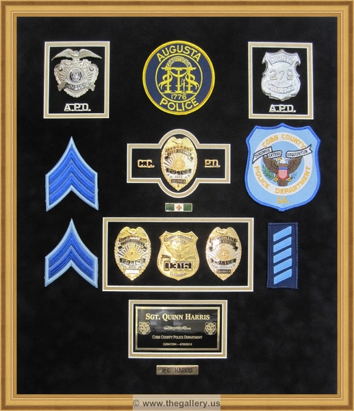 Cobb County Police Department retirement shadow box with police badges, patches, ID cards and lapel pins.


military shadow box layouts, military shadow box plans, how to build a military shadow box display case, military shadow box near me, military shadow box ideas, military shadow box display case, military shadow box with uniform, military shadow box with flag, 



The Gallery at Brookwood
www.thegallery.us
770-941-3394
Your Custom Framing Expert
Picture Framing Examples
Custom Framing Examples
Shadowbox Examples
cobb-county-police-department-retirement