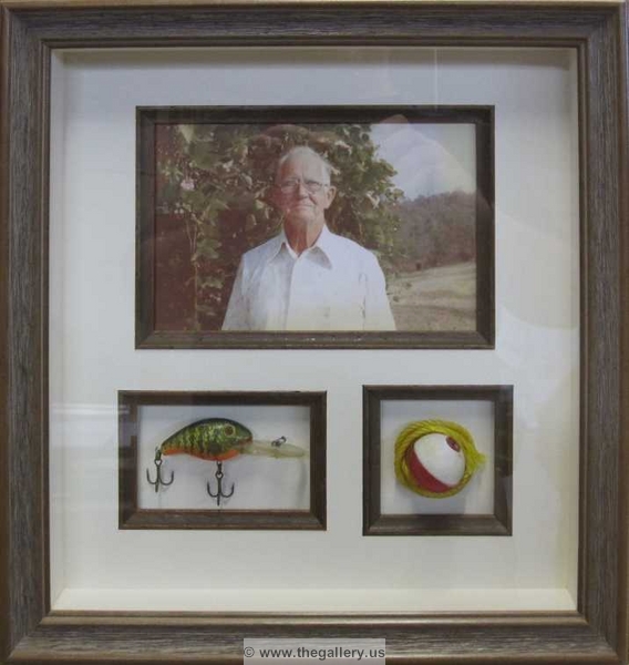 Framed photo with fishing lure and float.






The Gallery at Brookwood
www.thegallery.us
770-941-3394
Your Custom Framing Expert
Picture Framing Examples
Custom Framing Examples
Shadowbox Examples
fishing_shadow_box_with_lure_and_photo
