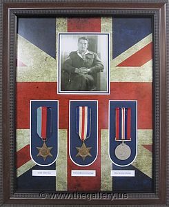 Framed War War 1 medals with photo and Union Jack matting.

The Gallery at Brookwood
www.thegallery.us
770-941-3394
Your Custom Framing Expert
Picture Framing Examples
Custom Framing Examples
Shadowbox Examples
