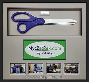 Shadowbox of the ceremonial ribbon cutting scissors and photos from business opening in California
30 inch Scissors 

The Gallery at Brookwood
www.thegallery.us
770-941-3394
Your Custom Framing Expert
Picture Framing Examples
Custom Framing Examples
Shadowbox Examples