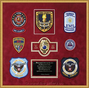 Cobb County Fire Department retirement shadow box with badges, patches and lapel pins.

The Gallery at Brookwood
www.thegallery.us
770-941-3394
Your Custom Framing Expert
Picture Framing Examples
Custom Framing Examples
Shadowbox Examples