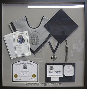 Paulding County Georgia High School Graduation Shadow box with hat, tassel, high school diploma and graduation announcement.

The Gallery at Brookwood
www.thegallery.us
770-941-3394
Your Custom Framing Expert
Picture Framing Examples
Custom Framing Examples
Shadowbox Examples