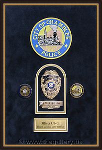 Police badge and patches shadowbox 

The Gallery at Brookwood
www.thegallery.us
770-941-3394
Your Custom Framing Expert
Picture Framing Examples
Custom Framing Examples
Shadowbox Examples